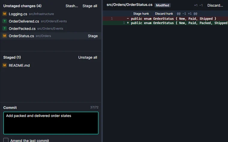 Lists of unstaged and staged files, with the file diff on the right showing added lines in green and removed lines in red.