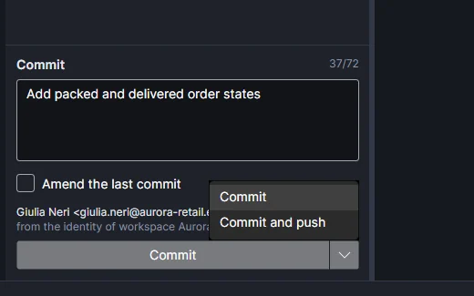 Commit area with the message, the identity in use and the Commit button menu open on Commit and push.
